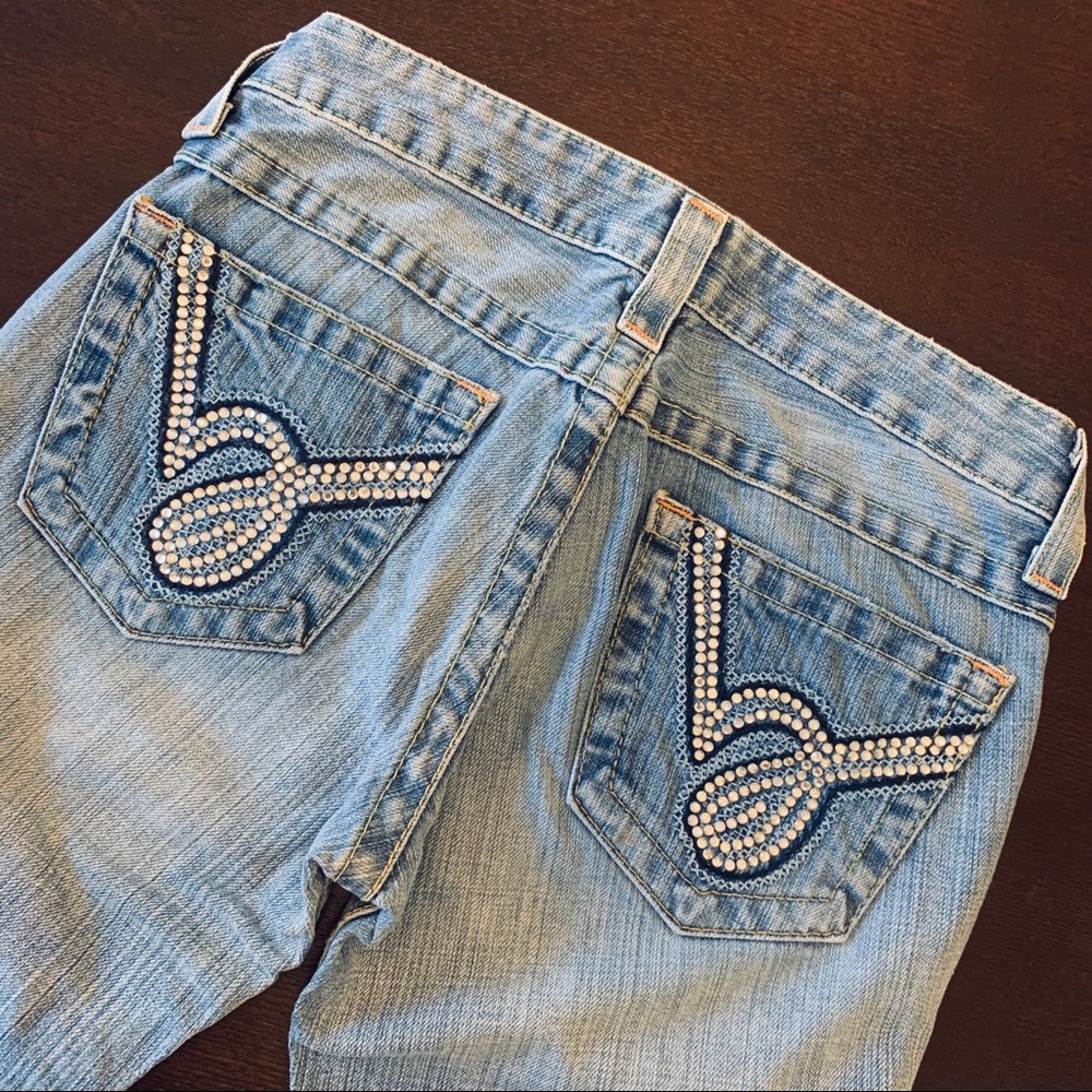 Bebe light-washed low-rise denim flair jeans